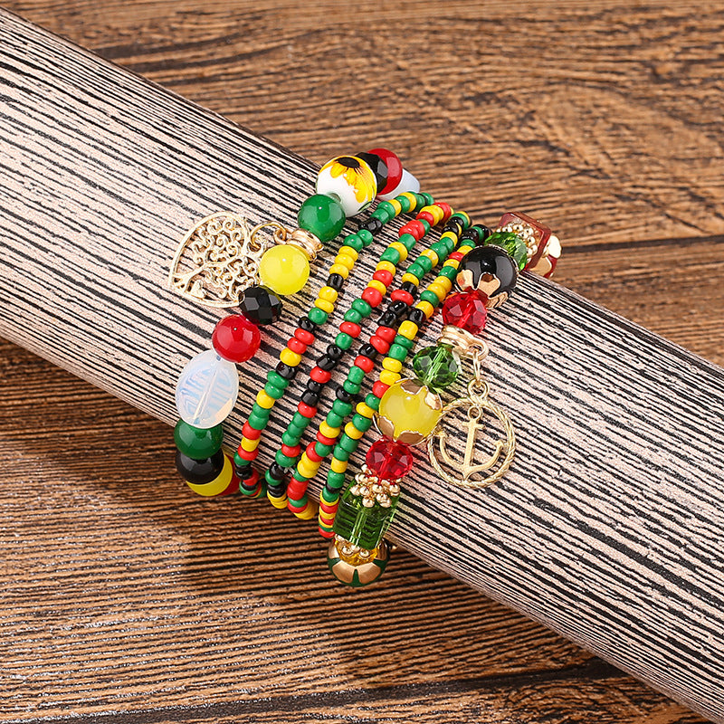 Pulsera con cuentas de múltiples colgantes cuidadas al por mayor